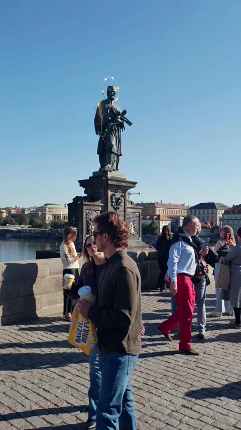 Prague, Czech Republic – September 23, 2026: Tourists on the Charles Bridge Stock Footage 346289975