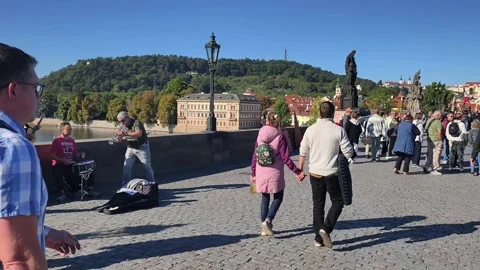 Prague, Czech Republic – September 23, 2026: Musicians on Charles Bridge Stock Footage 346289986