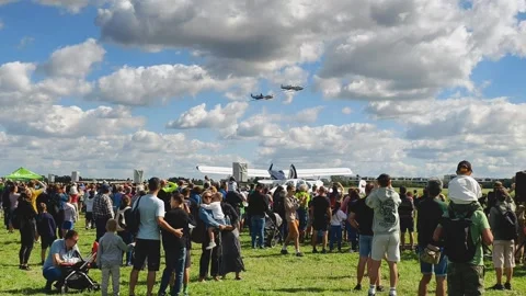 Prague, Czech Republic – September 5, 2026: Crowd Watching Low Flying Aircraft Stock Footage 345064367