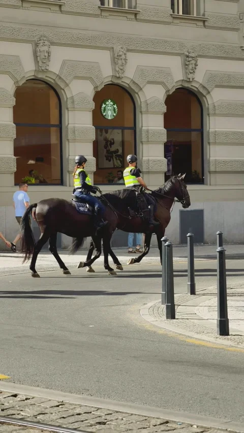 Prague, Czech Republic – September 6, 2026: Two Mounted Police Officers 4K Stock Footage 344878236