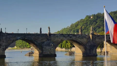 Prague, Czech Republic – September 8, 2026: Pedestrians cross Charles Bridge Stock Footage 345063427