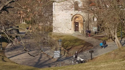 Prague - Elevated view of people walking by Rotunda of Saint Martin at Vysehrad Stock Footage 105766087