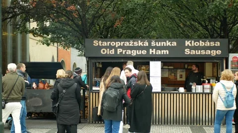 Prague ham stall leg pork meat food smoked boneless Prazska sunka street tourist 스톡 동영상 341149877