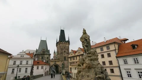 Prague historical Charles bridge empty nobody because of covid restrictions Video stock 154003633