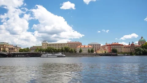 PRAGUE - JUNE 6: Time lapse Ships sailing along the Vltava River in Prague on Stock Footage 76884453
