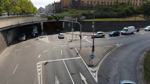 PRAGUE - JUNE 6: Time lapse shot. Cars, trams, and buses cross the crossroad on Stock Footage 76935679