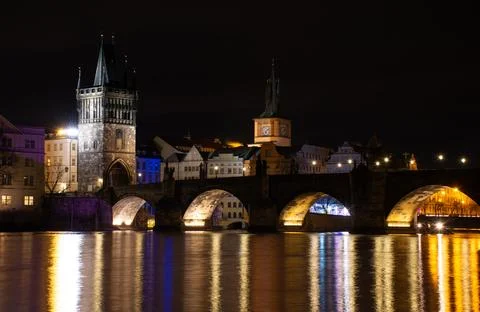 Prague at night, Charles bridge, reflection of lights in the Vltava river, .. Stock Photos