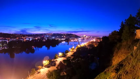 Prague night time lapse river view in Czech Republic Europe Stock Footage 282250055