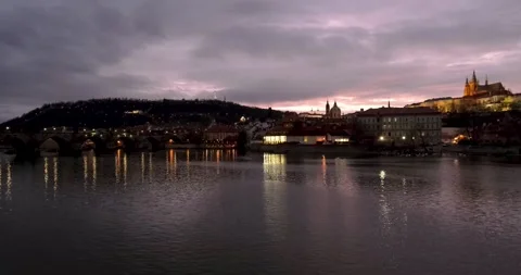 Prague Night View of Charles Bridge Petrin Tower and Nicholas Church Stock Footage 142955067