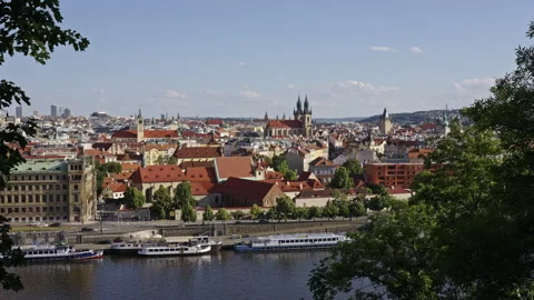 Prague Old Town Skyline with Trees and Vltava River Stock Footage 313384950