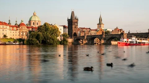 Prague timelapse with boats on the river under the Charles bridge, Czechia Stock Footage