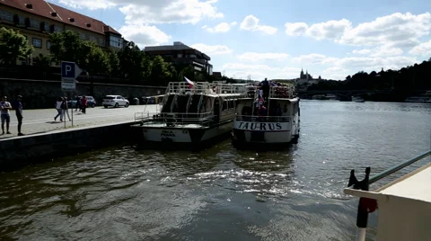 Prague Tourists dock boat pull away Stock Footage 53852603