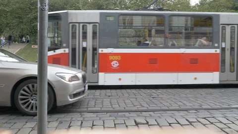 Prague tram stopping at platform, side view Stock Footage 117179790