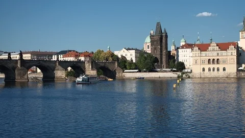 Prague - View of river with Charles Bridge and Old Town Bridge Tower. 4K Stock Footage 94255237