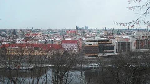 Prague view of Vltava river and old town roofs with some snow Stock Footage 147927990