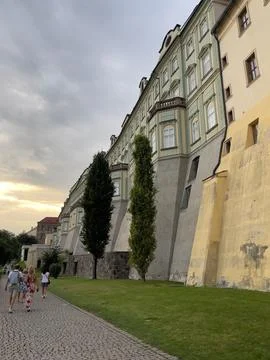 Prague's Historic Architecture Framed by Dramatic Sky and Lush Plant Life Stock Photos