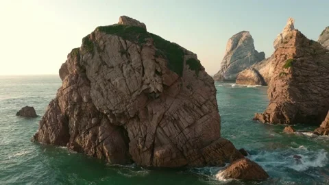 Praia da Ursa revealing behind rocks 4K Sintra Portugal Stock Footage