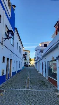 Praia De Odeceixe Mar Windmill, Faro district, Algarve, Portugal. Rota Vicent 库存照片