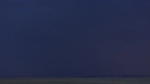 Prairie storm at night with multiple lightning flashes Stock Footage 59526308
