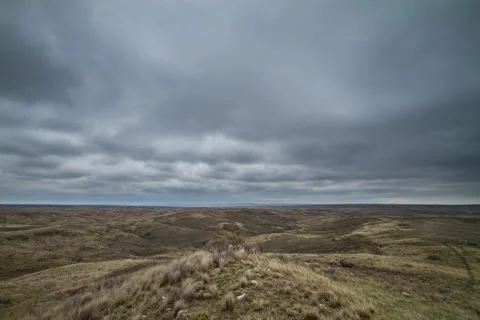 Prairie Time Lapse - Rain Clouds over Hills Stock Footage 54185578
