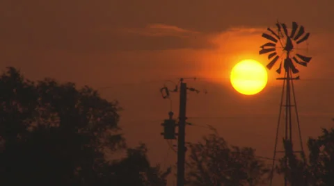 Prairie windmill sunrise Video stock 34623261