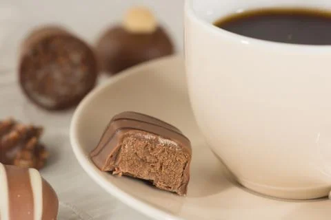 Praline and coffee Stock Photos