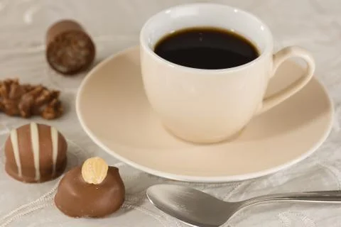 Praline and coffee Stock Photos