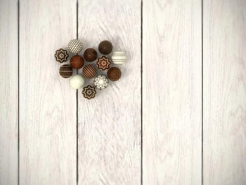 Praline easter eggs heart on white wooden floor - top view 스톡 일러스트