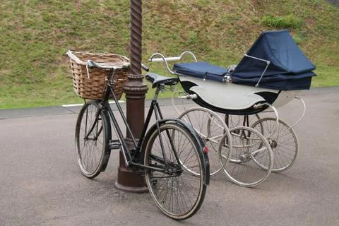 Pram and Bicycle. Stock Photos