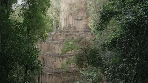 Prasat Baksei Chamkrong Temple - Ancient Hindu Pyramid in The Jungle of Angkor Stock Footage 231792496