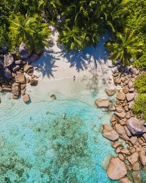 Praslin Seychelles tropical island with withe beaches and palm trees, coup... Stock Photos