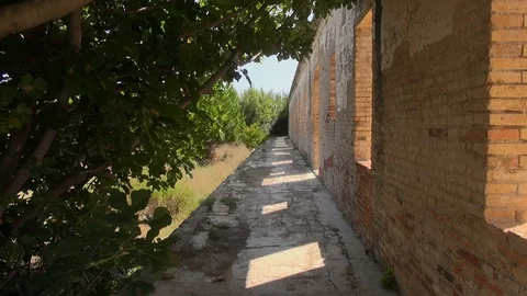 Prat cuartel barracks abandoned ruins exterior windows higuera fig Stock Footage 107186100