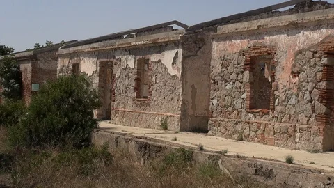 Prat cuartel barracks abandoned ruins pan Stock Footage 107186172
