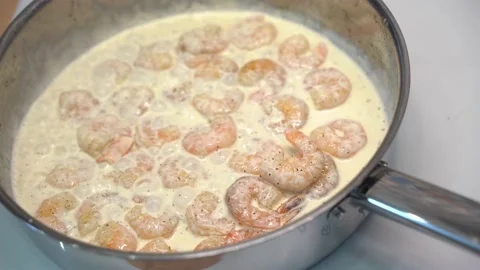 Prawns are fried in a frying pan Stock Footage 148553024