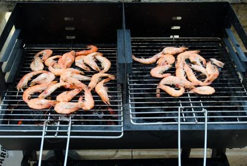 Prawns on bbq Stock Photos