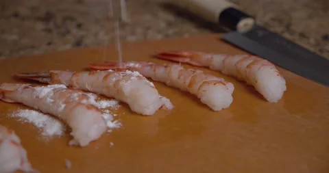 Prawns flour cutting board Stock Footage 147420536