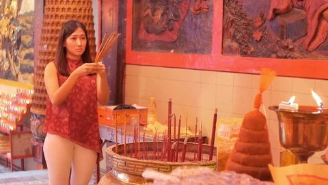 Pray Inside A Buddhist Temple Stock Footage 123813316