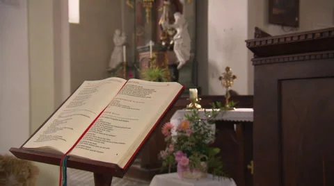 Prayer book in Catholic chapel Stock Footage 58662147