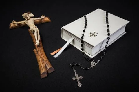 Prayer book, rosary and cross Stock Photos