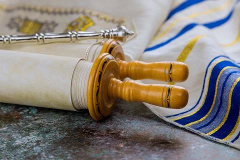 Prayer book with torah scroll and prayer shawl tallit jewish religious symbol Photos