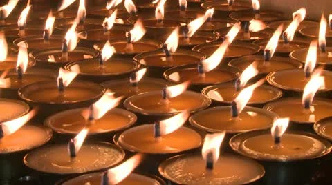 Prayer candles fill the frame 스톡 동영상 10787597
