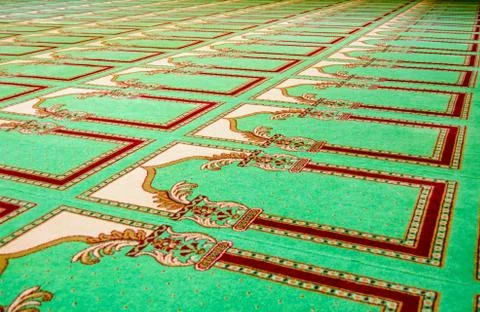 Prayer carpet in a mosque Stock Photos