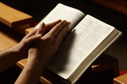Prayer at the church Stock Photos