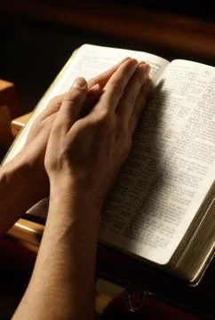 Prayer at the church Stock Photos