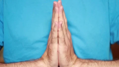 Prayer with connected hands while praying 動画素材 75026169