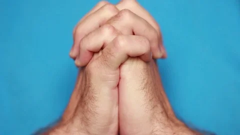 Prayer connected his hands closeup 動画素材 75026155