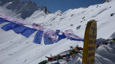 Prayer flag for blessing at Chang la pass on Khardung La Road in Himalaya, Leh Stock Footage 105689558