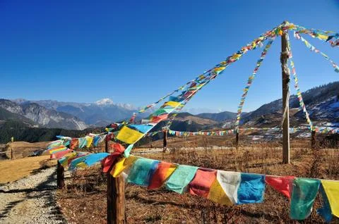Prayer flag with mountain Stock Photos
