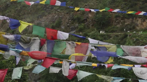 Prayer flags blowing in the wind in Bhutan Stock Footage 37164085
