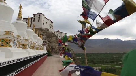 Prayer flags blowing in the wind at a Buddhist monastery Video stock 44182679
